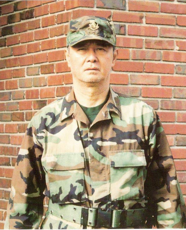 Mahn Robert Ba Zan posing in his Karen army uniform as an adult
