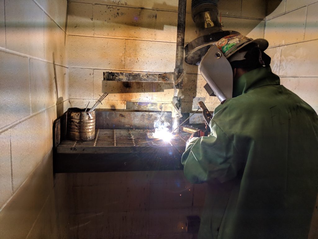 AMR program participant working at a foundry.